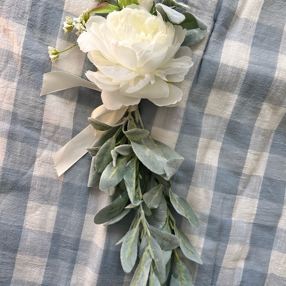 Elegant White Floral Accent with Greenery